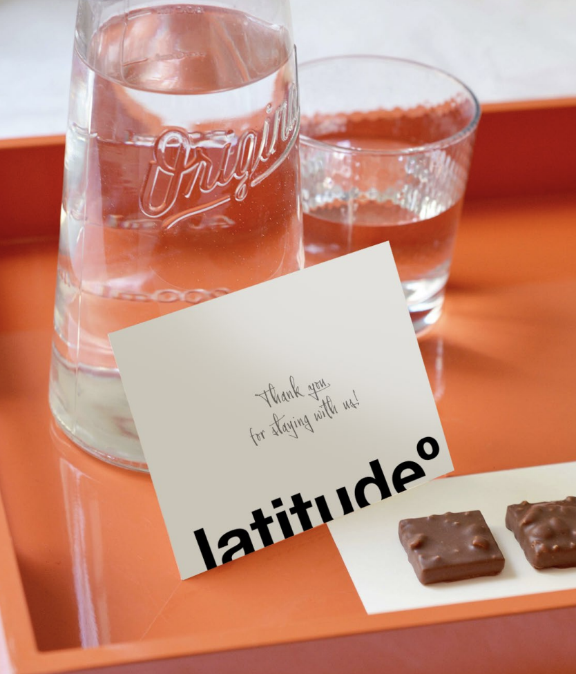 Latitude welcome tray with thank-you card and chocolates