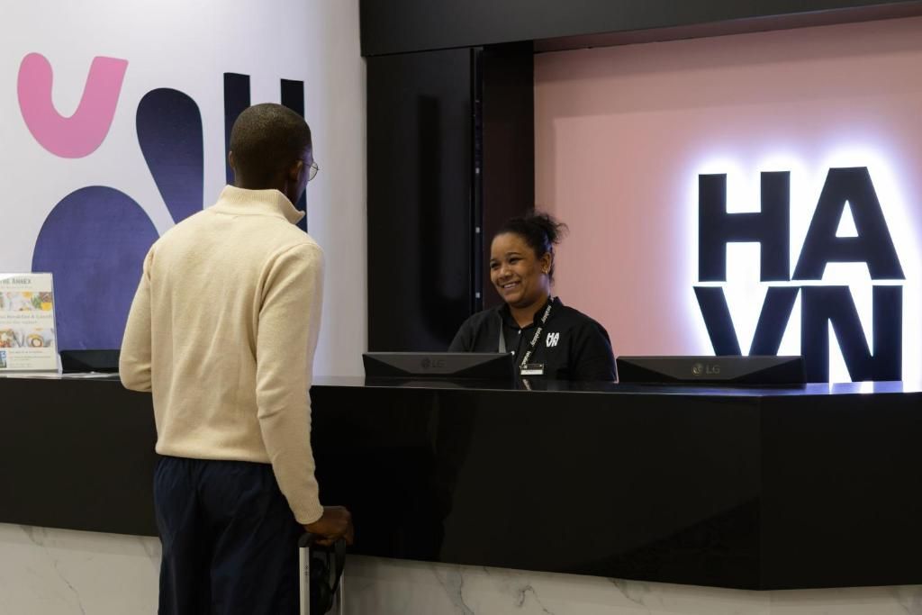 HAVN reception and illuminated brand signage